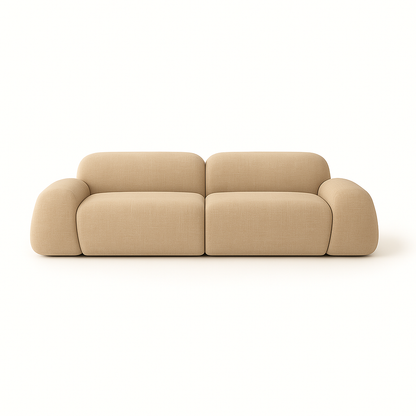 Two-section orange sofa in a neutral living room with a geometric green rug and beige curtains on either side.
