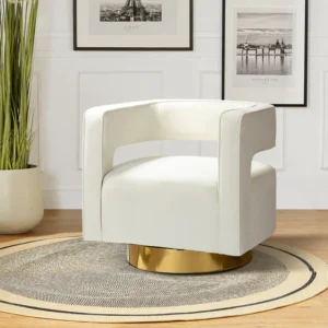 White upholstered armchair with a gold circular base sits on a round rug in a bright, modern living room.